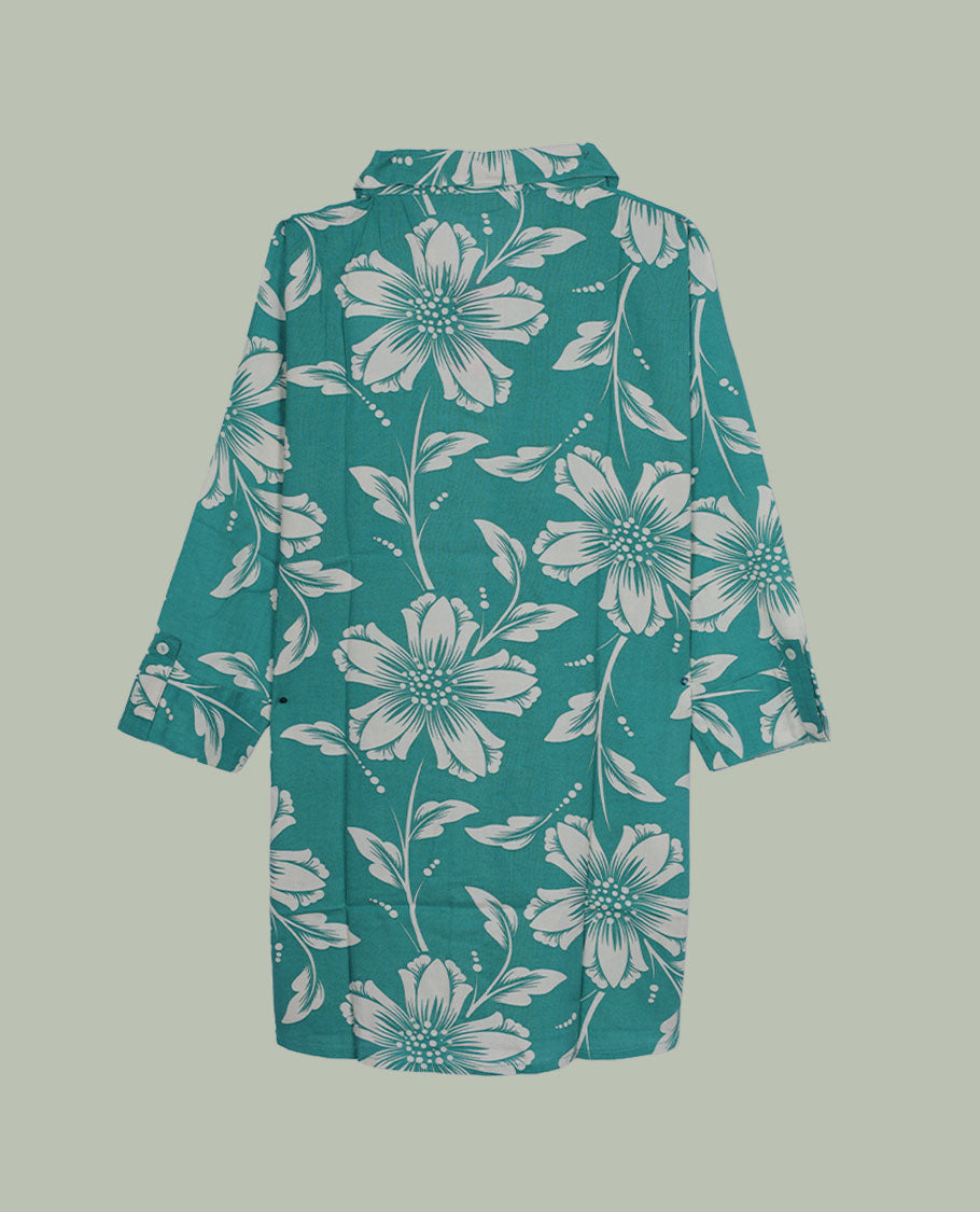 Teal colour floral printed shirt dress featuring a classic shirt collar, full button-down placket, long sleeves with cuff detail, and a straight knee-length silhouette.