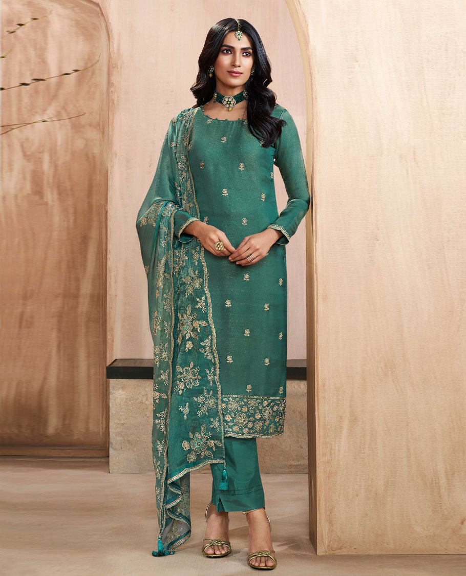 Pine green colour silk suit material with heavy kurta embroidery and stone work , paired with premium soft santoon bottoms and a silk dupatta detailed with rich floral kodi work