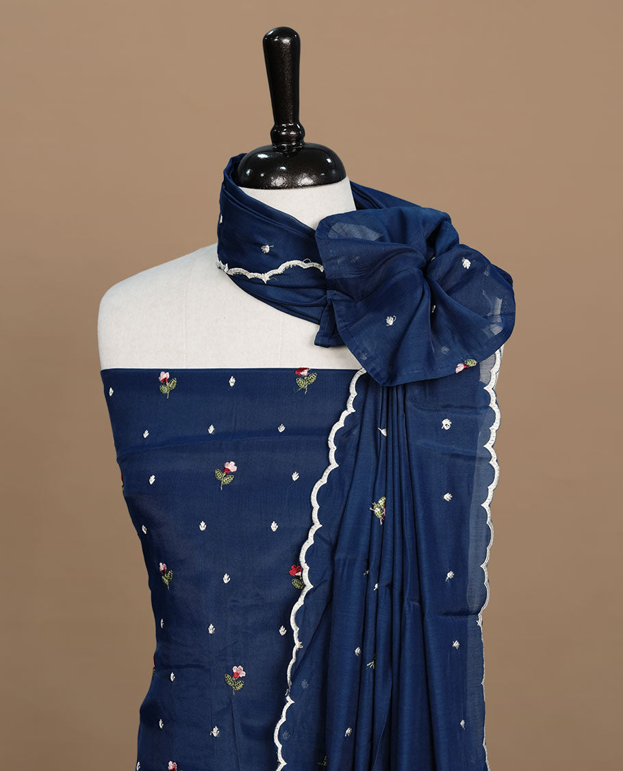 Blue colour Mulchanderi salwar suit featuring thread floral buttas on the body and matching dupatta, paired with a santon bottom.