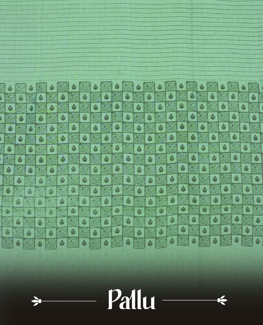 Pastel Green colour poly cotton saree with black vertical dotted line pattern on the body, paired with a matching pallu featuring black zigzag geometric border, and a coordinated all‑over black stylised fleur‑de‑lis printed blouse piece.