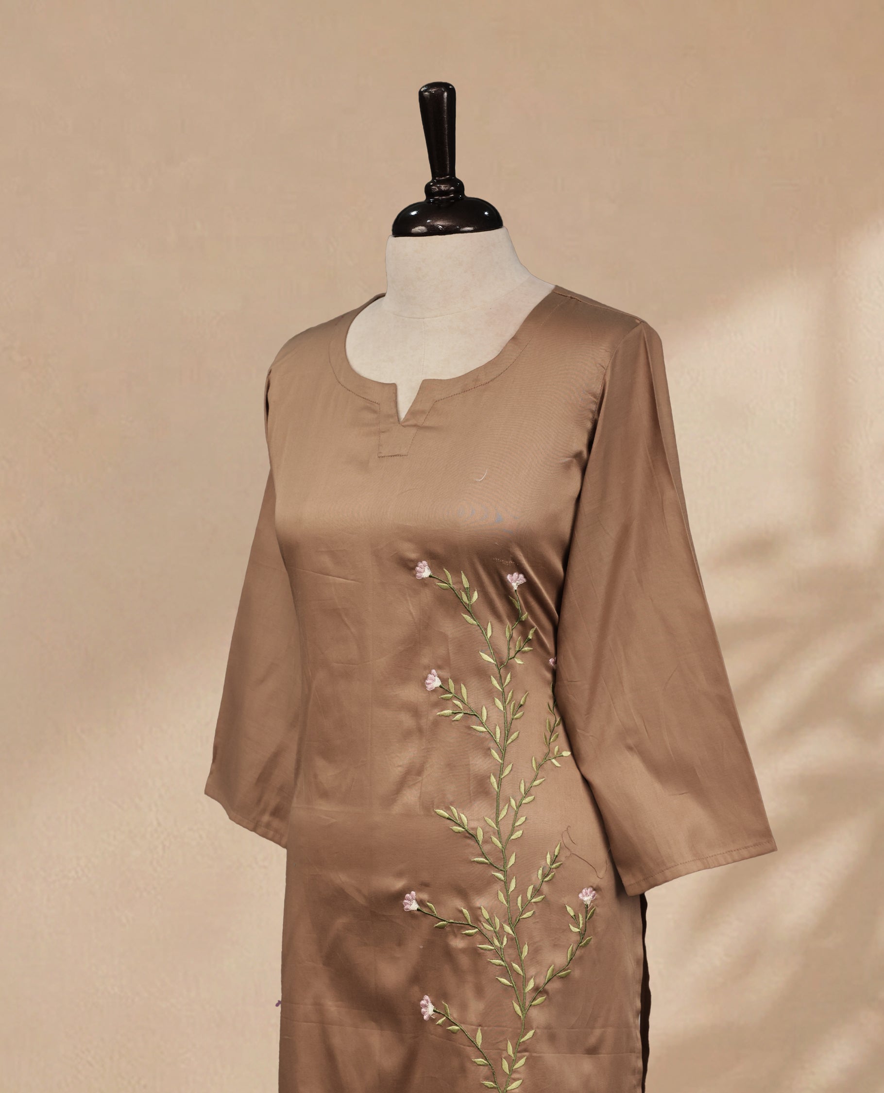 Light Brown Colour Kurti Featuring U-Shaped Neckline, delicate floral vine embroidery Work On Body & Sleeve