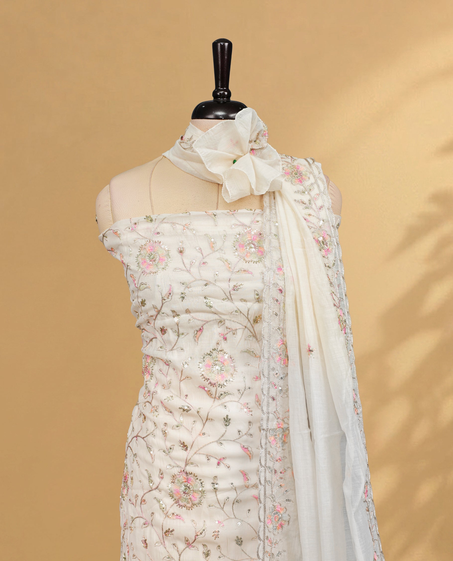 Cream colour Salwar Material Featuring Thread & Cut Beats worked body, paired with matching Bottom piece & dupatta.