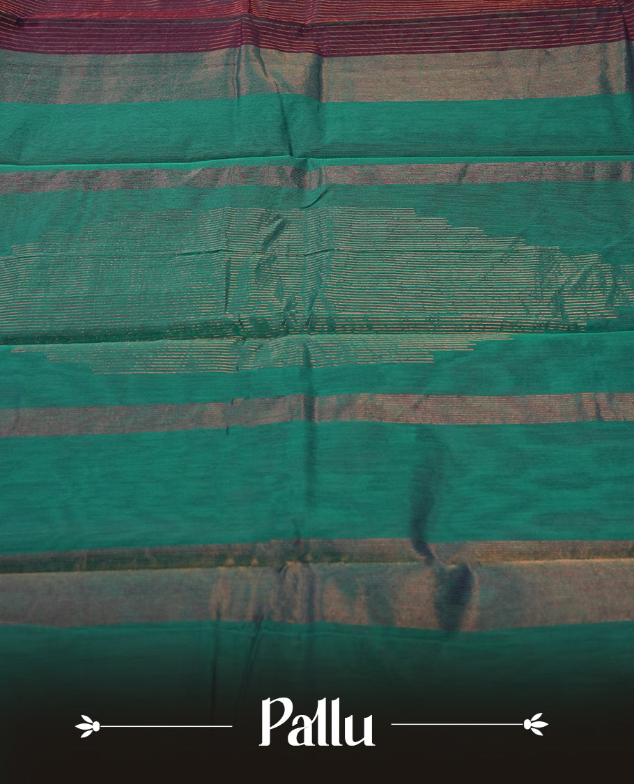 Grape colour silk cotton saree featuring with full of delicate vertical copper zari lines on the body & rich green colour pallu, Crafted without a border for a classy touch, Comes with a matching blouse for a perfectly coordinated look.