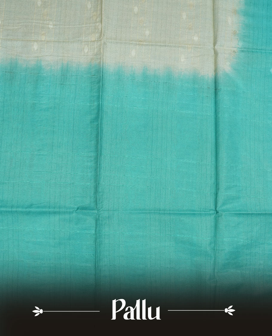 Cream & aqua dye pattern colour semi jute saree highlighting white stripped body, without border and paired with matching blouse.