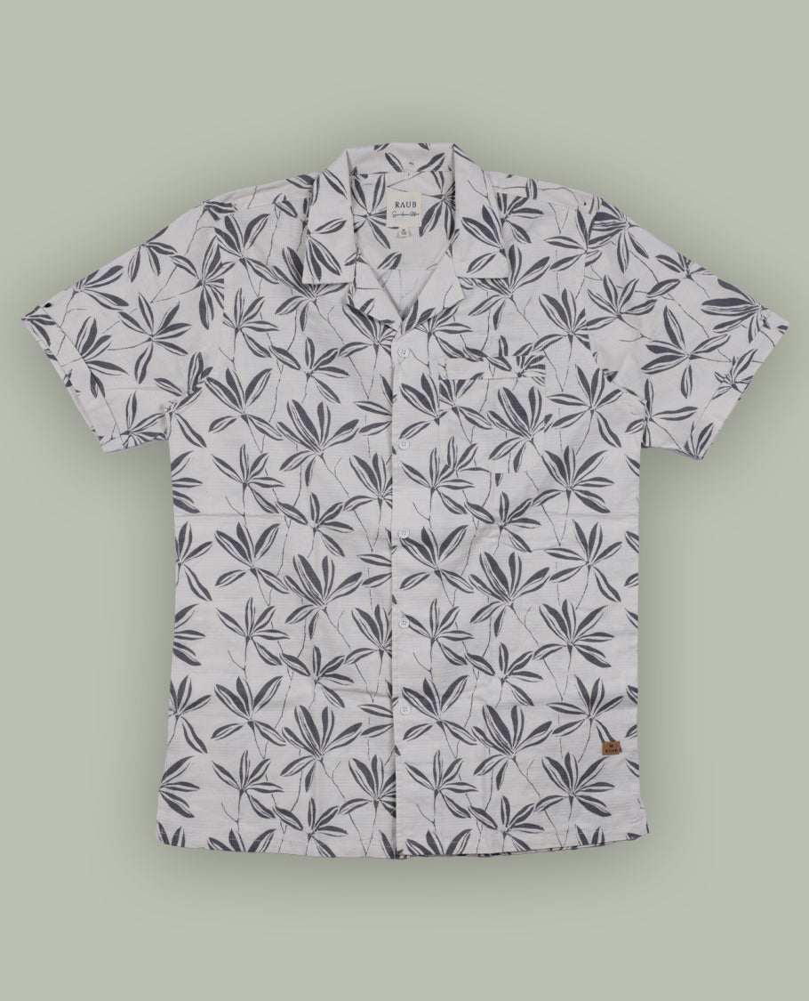 Off white colour short sleeve shirt features a rounded spread collar and a grey colour jacquard print all over & its ideal for both casual days and laid back evenings.