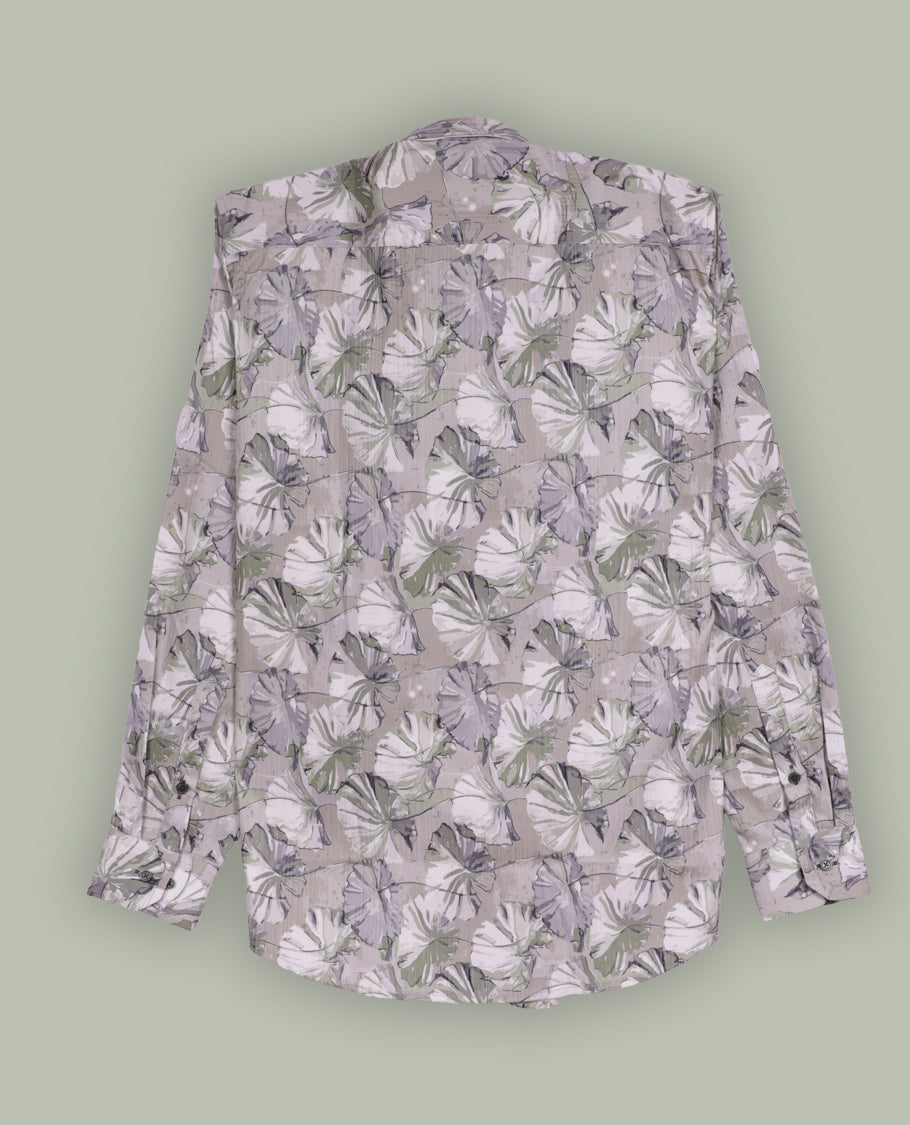 Beige colour shirt adorned with soft green & cream colour floral prints, Designed with a classic collar and full sleeves, this timeless piece offers a crisp and casual look, perfect for both work and weekend wear.