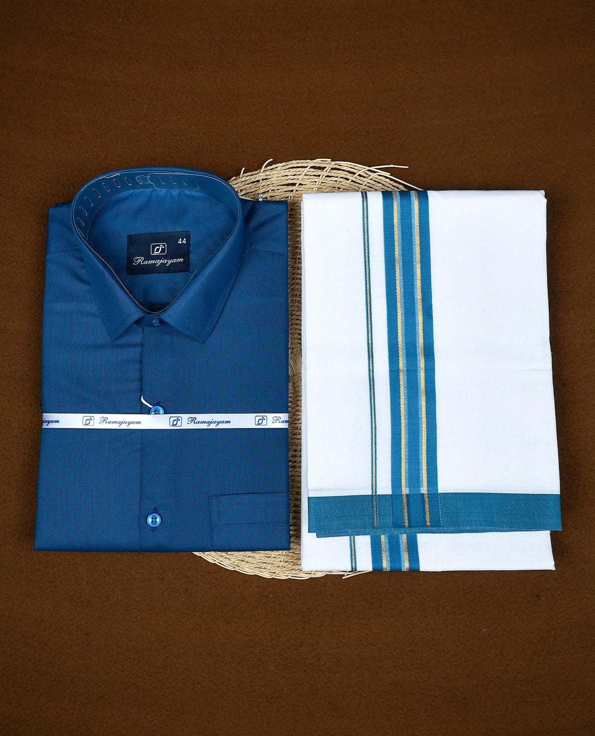 Royal Blue colour RAMAJAYAM shirt paired with a matching dhoti, finishing with a Blue & Gold kara