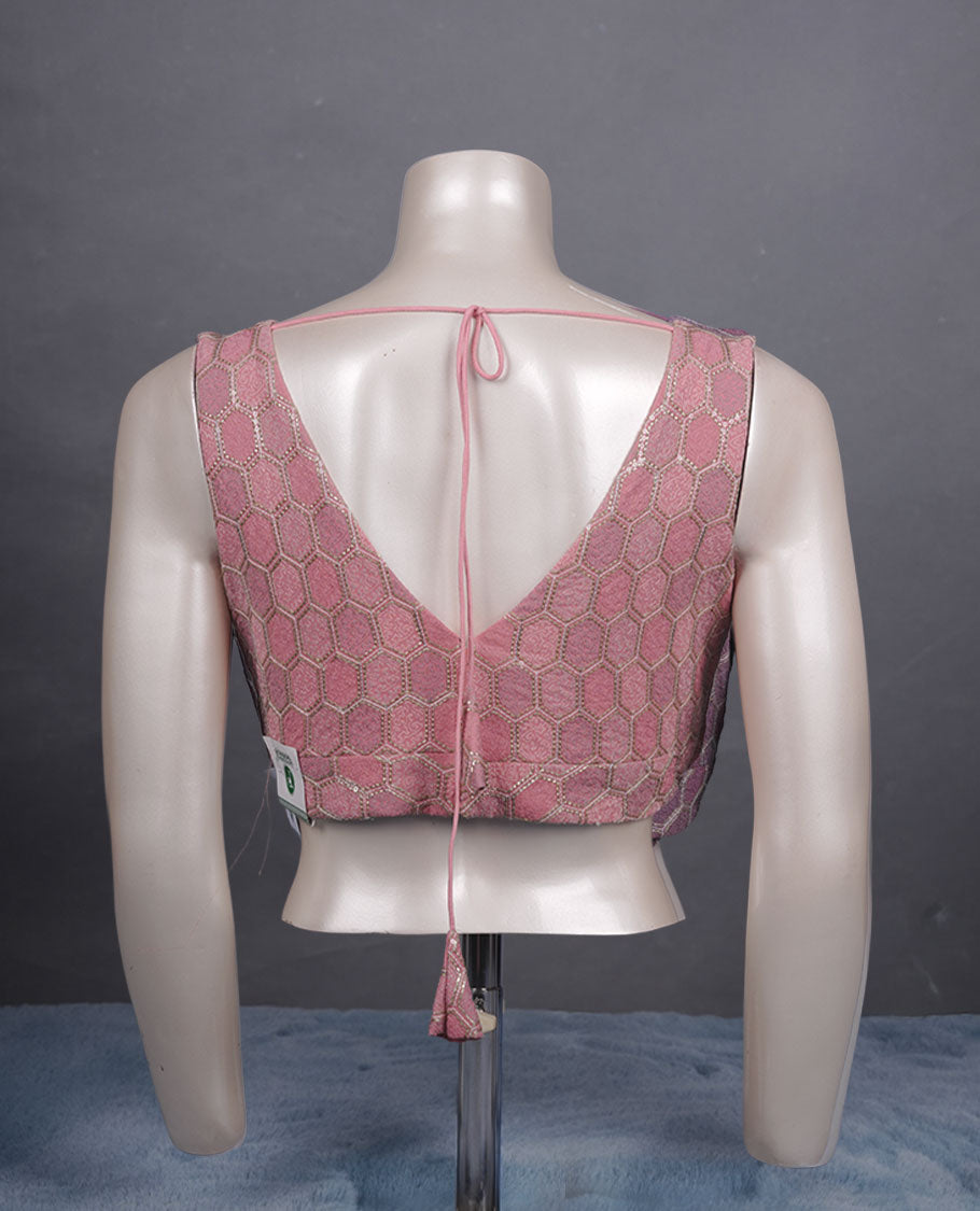 Light pink peach colour padded blouse with gold hexagon weave, sleeveless V-neck, and deep V-back with tie-up tassels.
