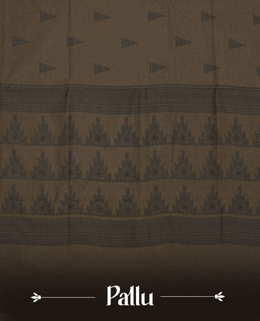 Dark olive brown poly cotton saree with black temple motifs on the body, paired with a matching pallu with black woven traditional border, and a coordinated all‑over geometric printed blouse piece.