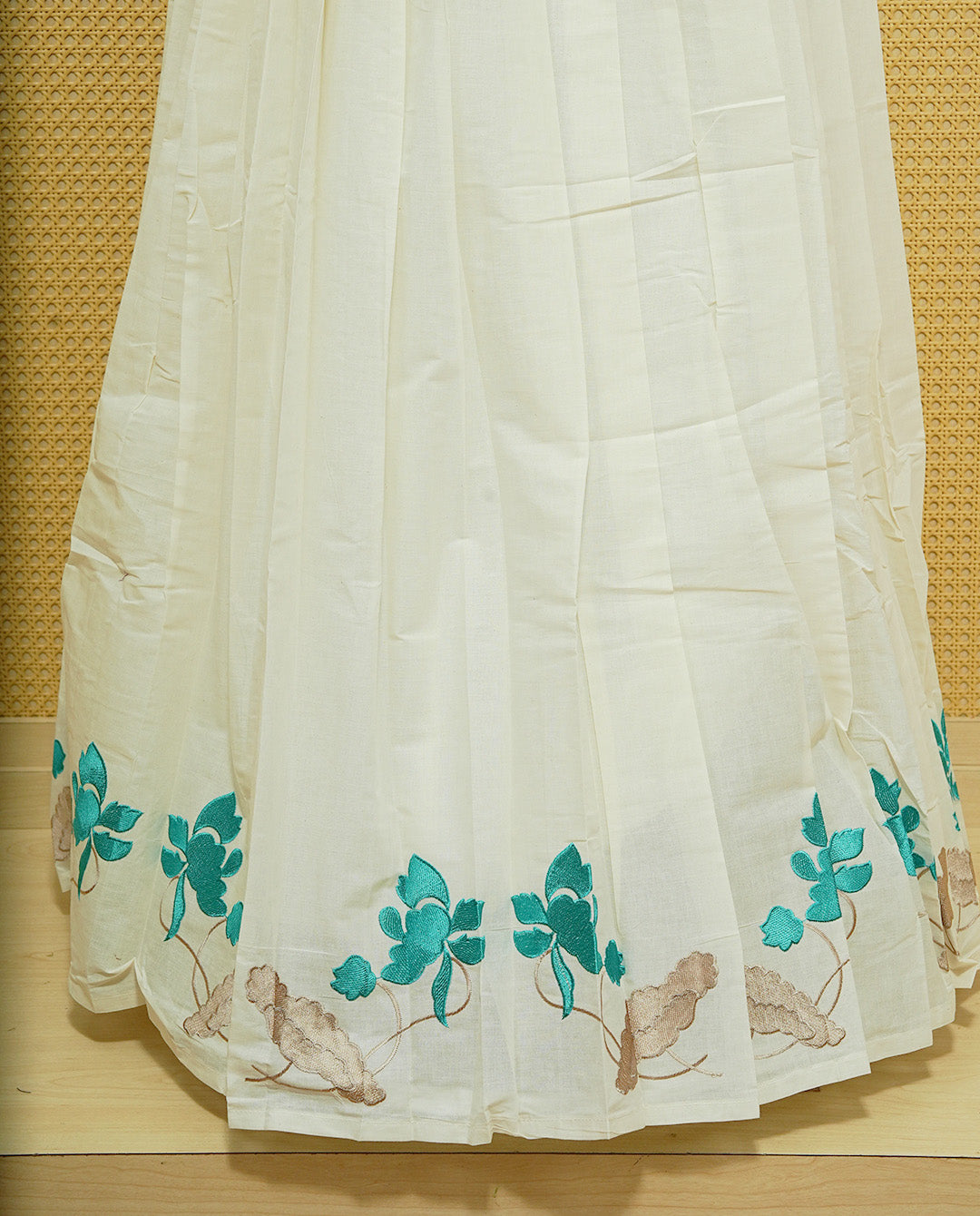 Cream colour cotton Stitched Skirt With Aqua colour floral & Leaf kodi thread pattern border.