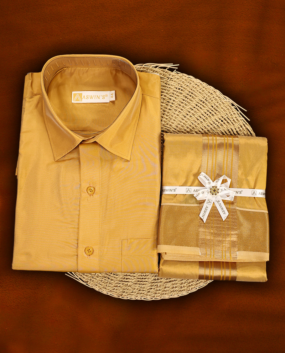 Gazel colour Aswin’s wedding set featuring a lustrous silk finish full sleeve shirt, paired with a matching dhoti and angavastram adorned with rich golden zari work, perfect for traditional celebrations.