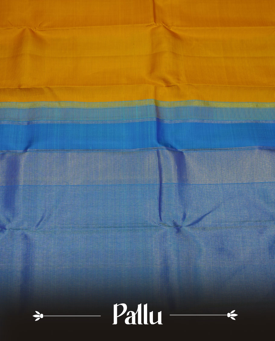 Mustard yellow colour pure traditional Kancheepuram silk saree featuring elegant contrast borders in shades of blue and green with classic zari detailing, beautifully paired with a matching blouse piece
