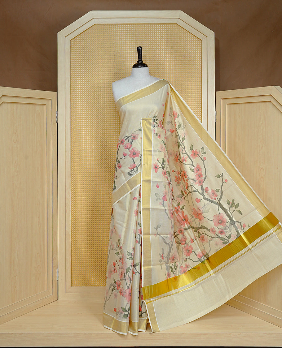 Cream colour Tissue kerala saree featuring Floral print on body, complemented by Floral Print & kasavu kara, comes with matching blouse piece.