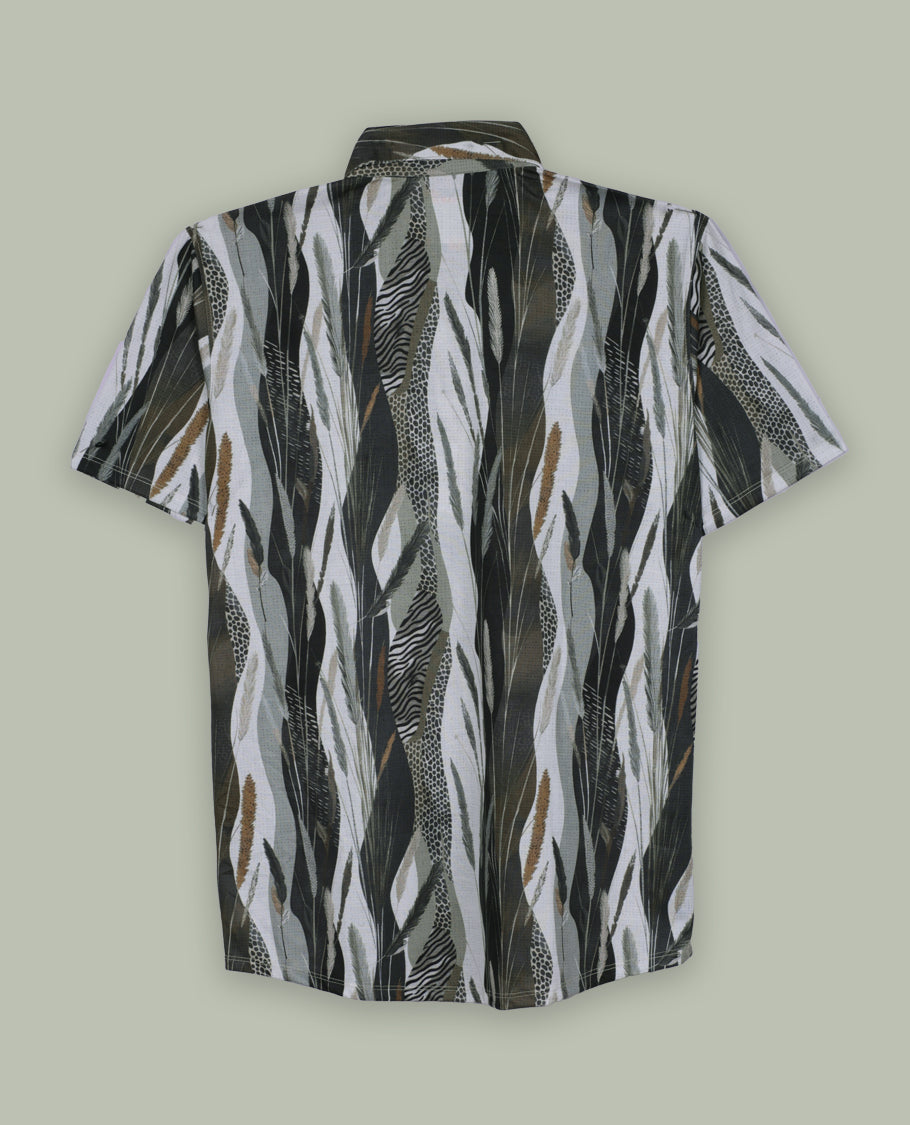 Green, black, and white shirt features a classic spread collar and short sleeves, Its bold feather like print and lightweight fabric make it perfect for casual wear or tropical getaways.