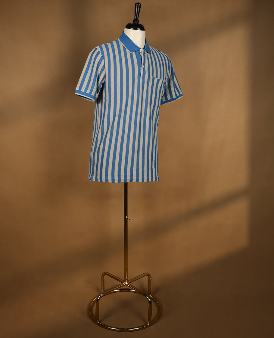 Blue and beige striped men's polo T shirt featuring a classic collar, half sleeves, button placket, and chest pocket crafted from breathable fabric for a timeless, casual, and comfortable look.