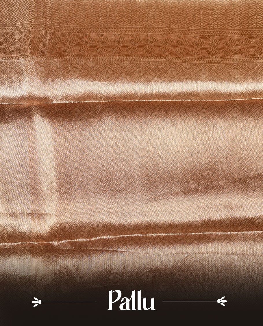 Dark Gold colour Pure banaras tissue silk saree featuring Silver zari brocade design across body, with contrast peach colour with gold zari brocade border, finished with a matching blouse.