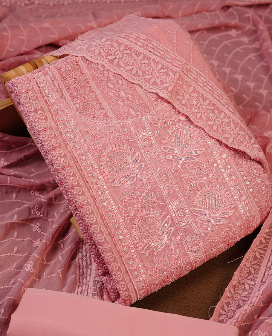 Peach colour churidhar Material featuring Intricate Thread Embroidery with Mirror and Cut Beads Work on the Front Panel, paired with an All Over Embroidered Net Dupatta and Matching Bottom