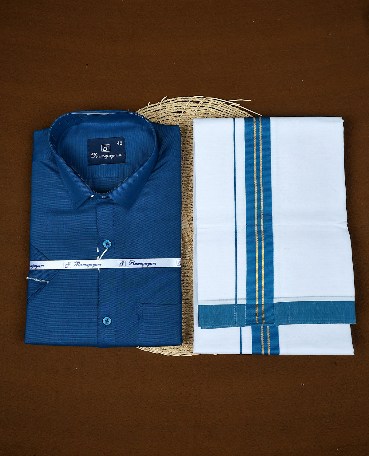 Royal Blue colour RAMAJAYAM shirt paired with a matching dhoti, finishing with a Blue & Gold kara
