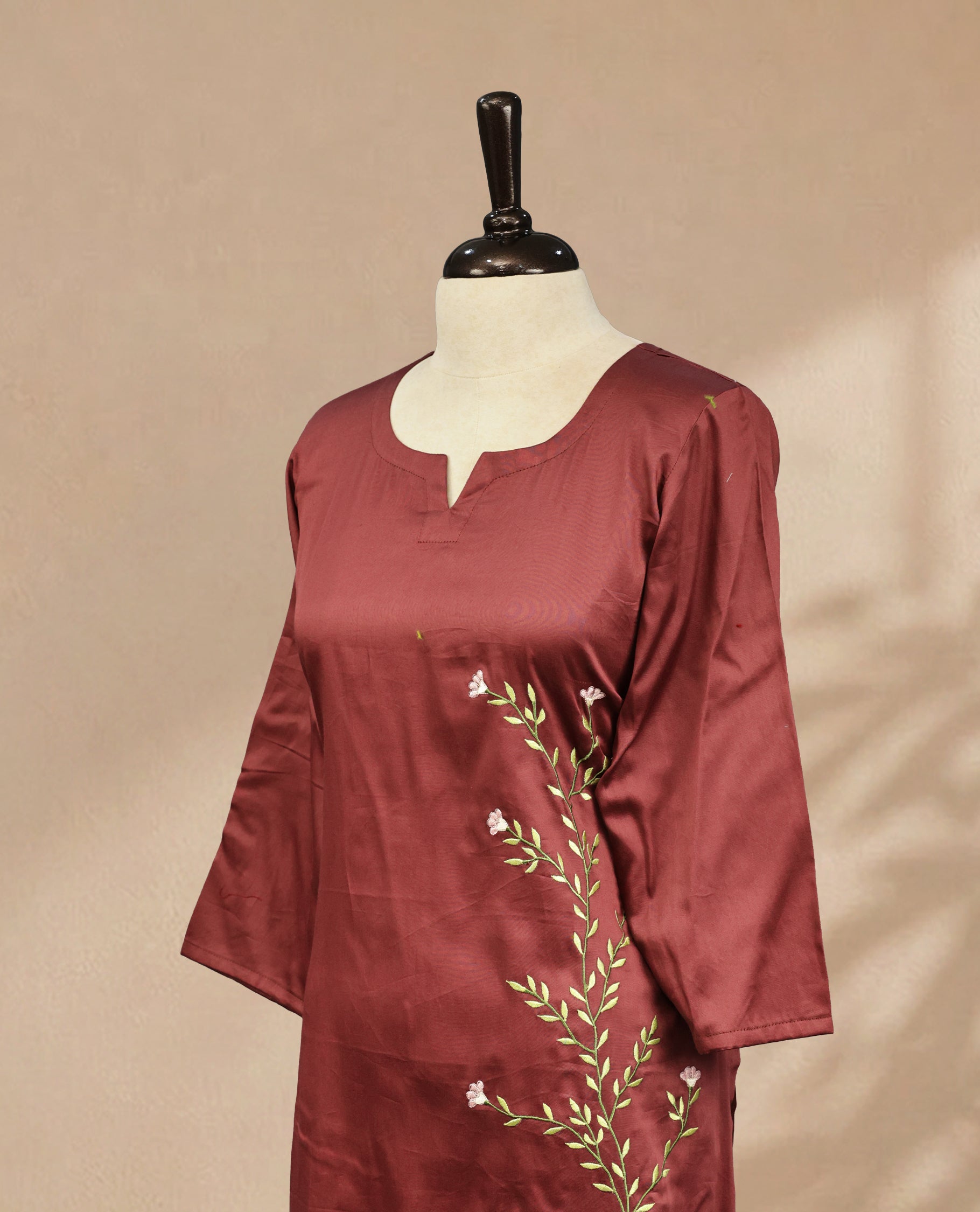 Rust Brown Colour Kurti Featuring U-Shaped Neckline, delicate floral vine embroidery Work On Body & Sleeve