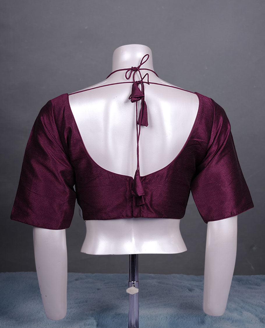 Wine colour colour silk padded readymade blouse with elbow-length sleeves, a V-neck front, and a deep U-back with tie-up dori.