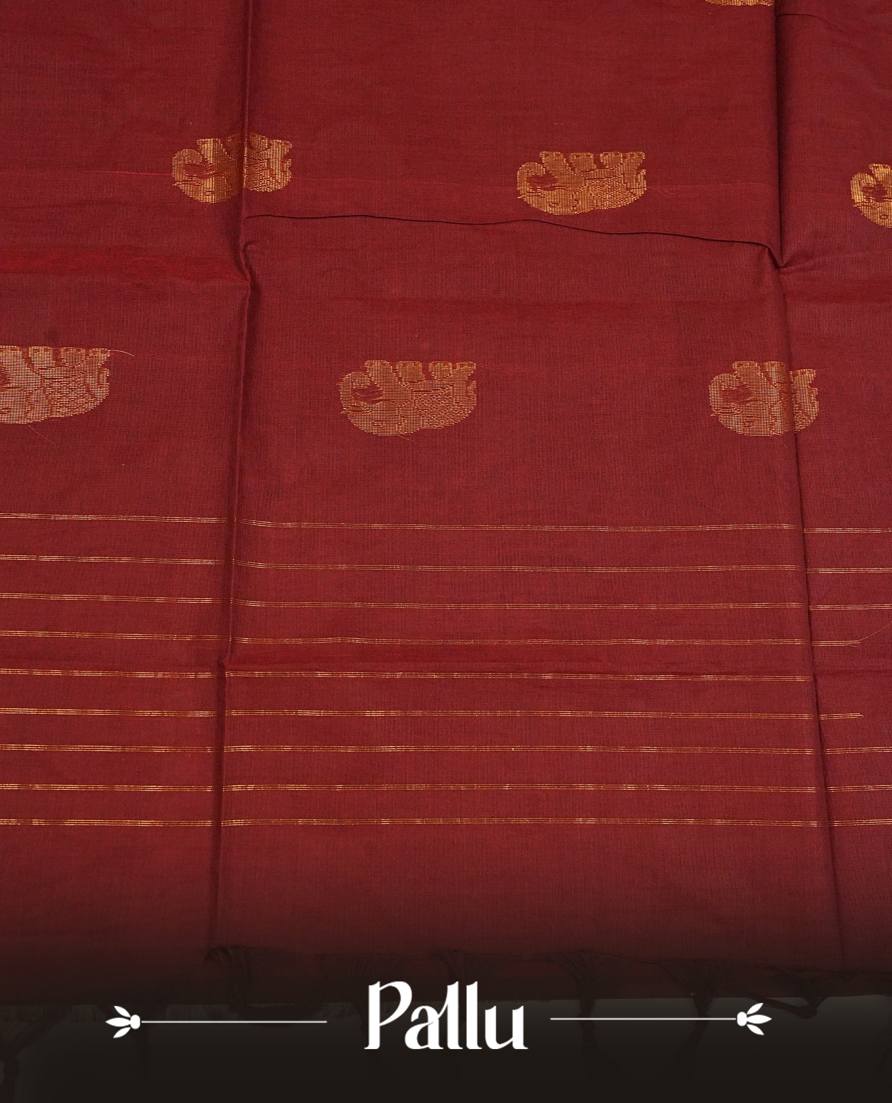 Redish brown colour chettinad cotton saree featuring gold zari motifs on body, Contrast magenta colour with Gold zari border, comes with matching blouse piece.