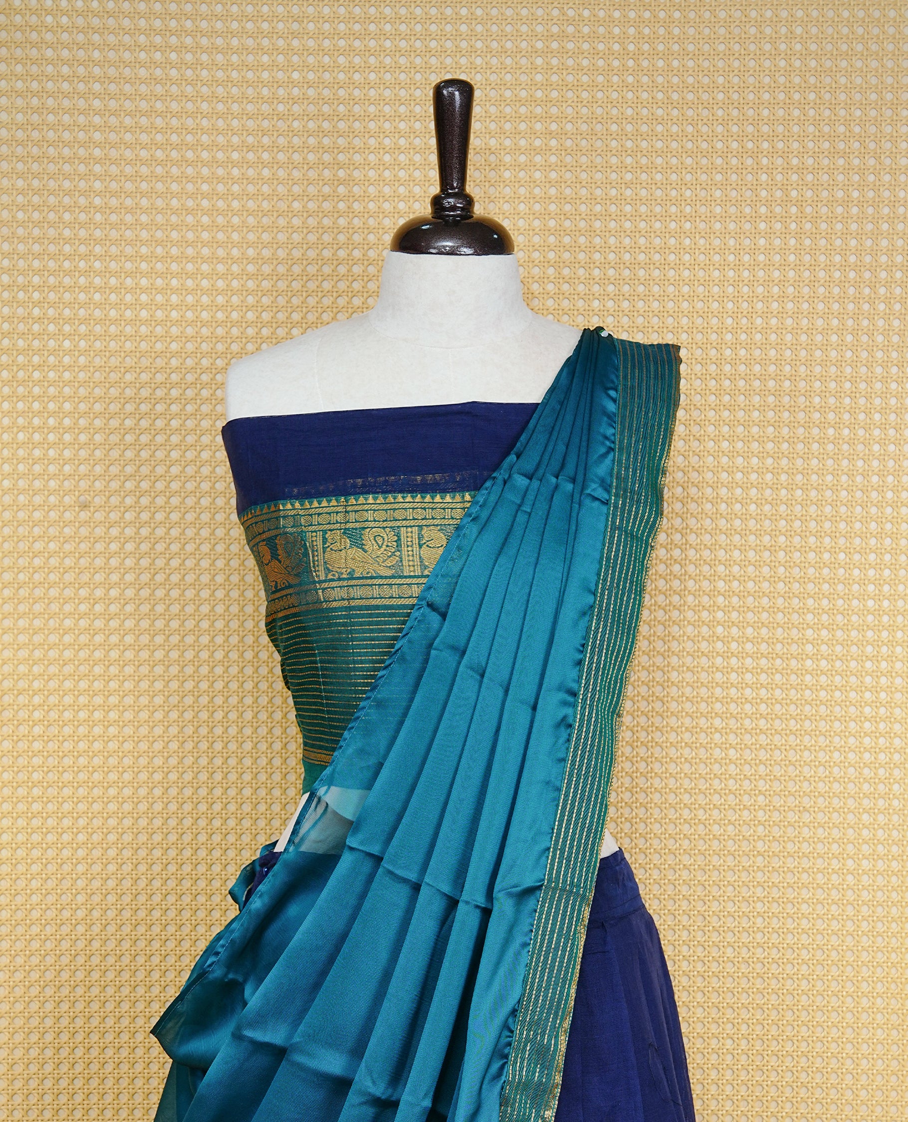 Navy Blue colour Dhavni set Featuring Navy Blue Skirt and Contrast Green colour with Zari border, paired with UnStitched Blouse & Elegant Dupatta.