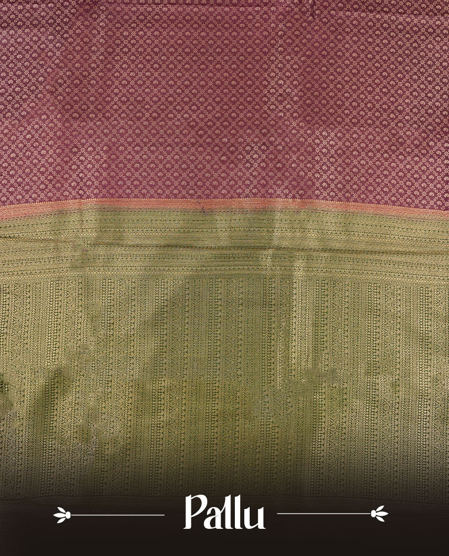 Grape Purple colour semi silk brocade saree featuring intricate Gold Floral kodi & leaf patterns across the body, complemented by a contrast green colour woven border and pallu, paired with a matching blouse.