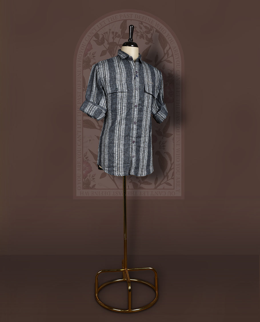Charcoal black colour cotton linen blended shirt featuring self striped detailing and a breathable textured weave, Designed with double flap chest pockets, roll up sleeves, and a button-down front.