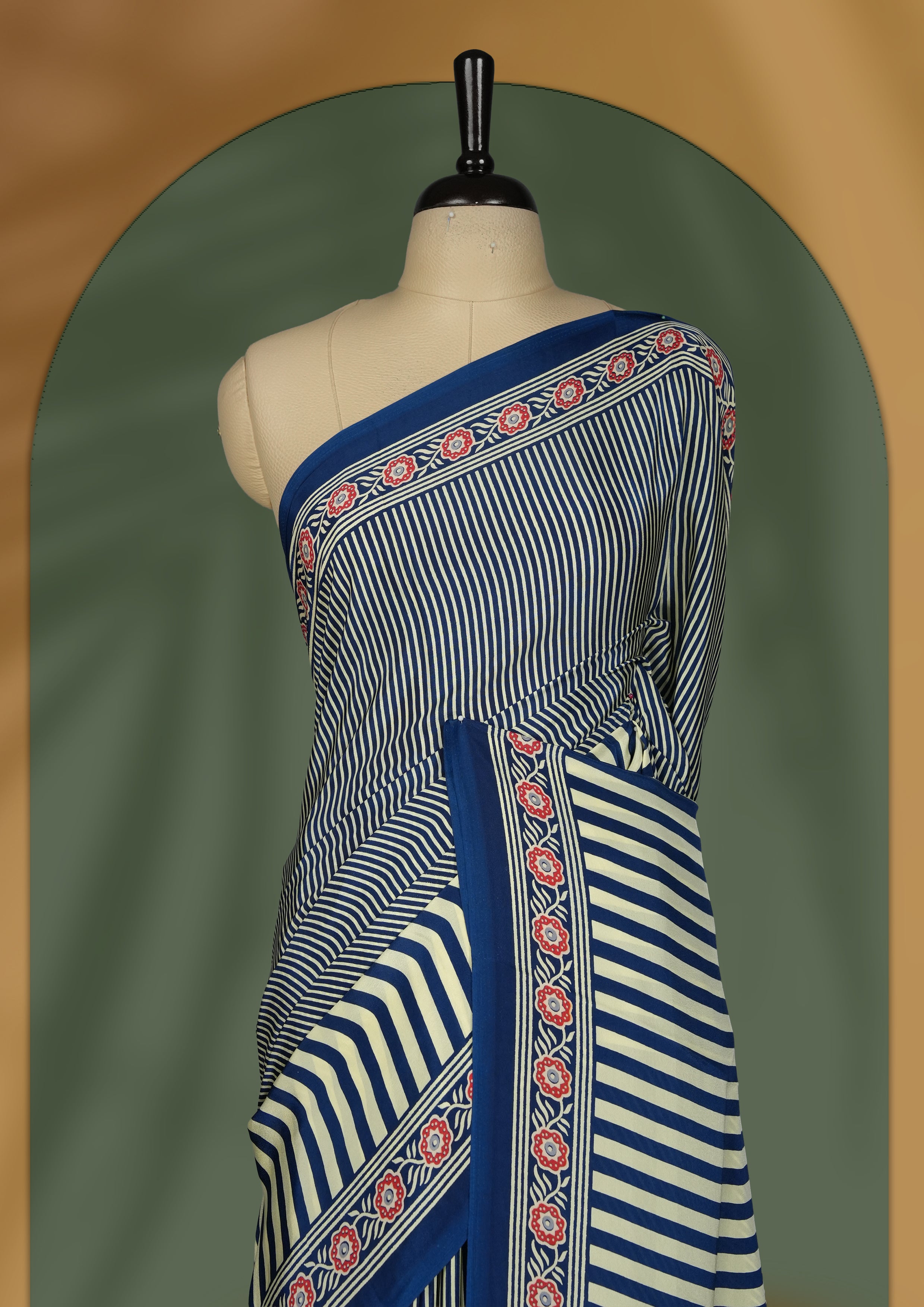 Navy blue and cream colour saree with fine vertical stripes and traditional floral borders & A bold circular motif enhances the pallu, giving it a contemporary twist, Lightweight and graceful, paired with matching blouse.