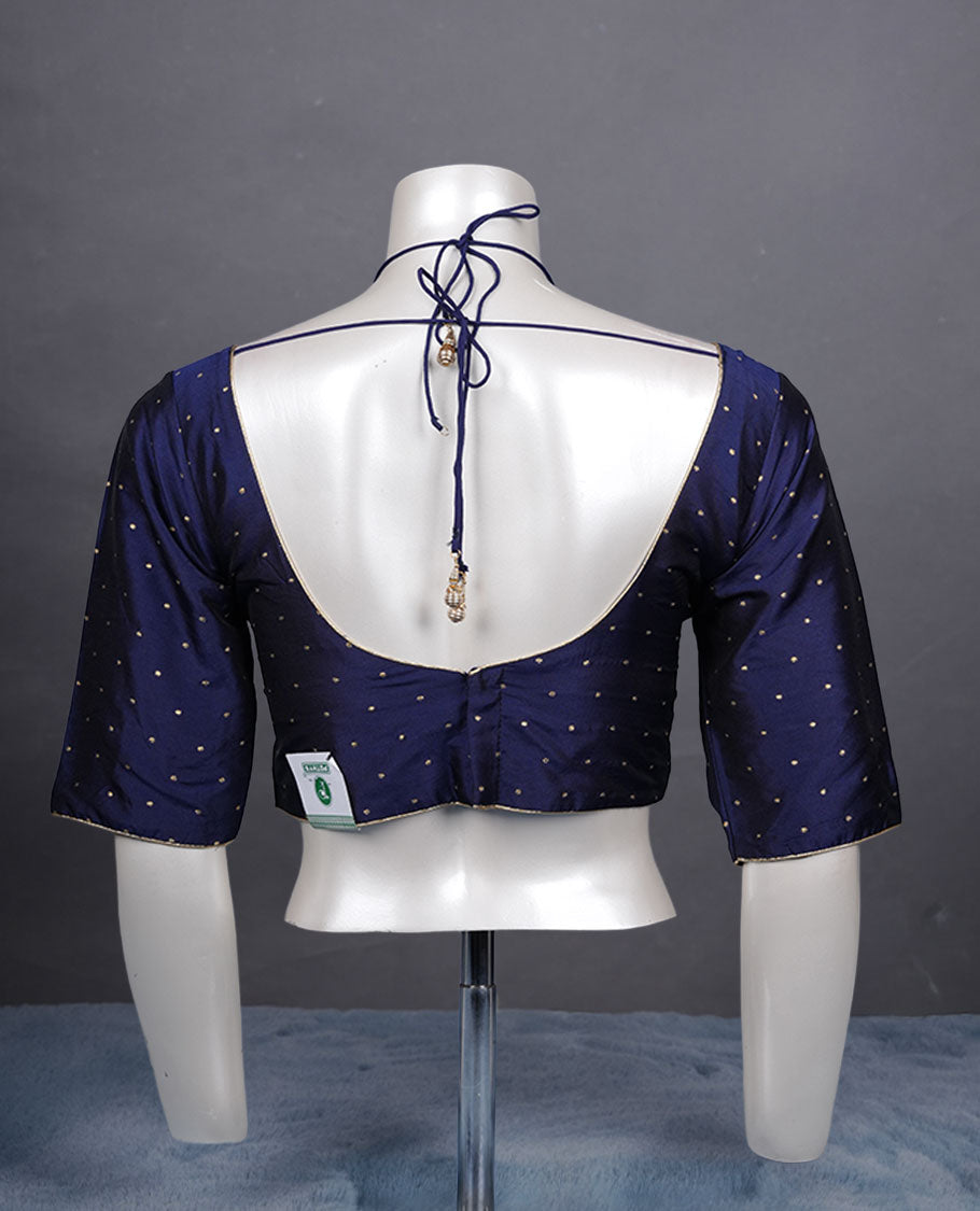 Navy blue colour padded blouse with gold polka dots, V neckline, elbow sleeves, and deep tie-up back.