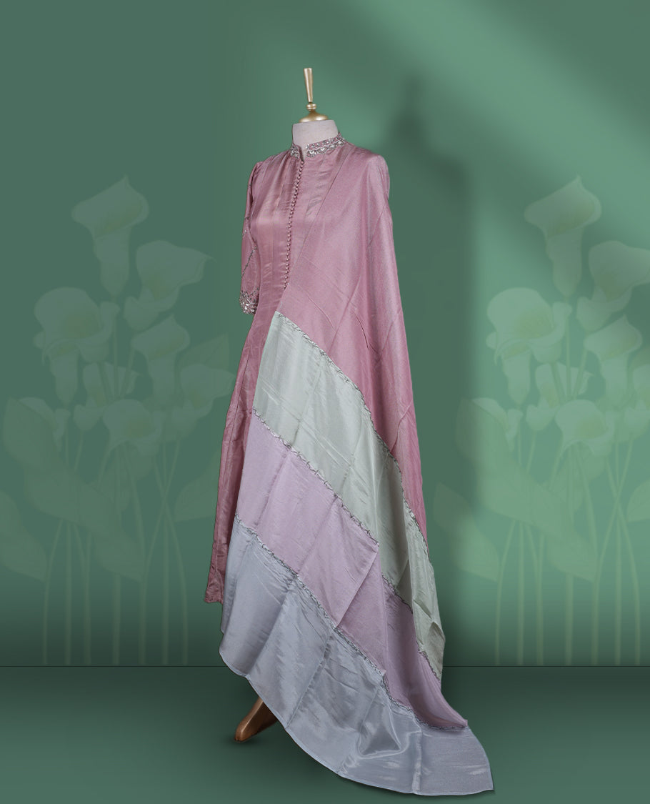 Onion pink colour Anarkali Suit featuring cut bead, pearl, and sequin work on the neckline and sleeves & Paired with a soft tri tone dupatta with plain bottom, perfect for festive and formal occasions.