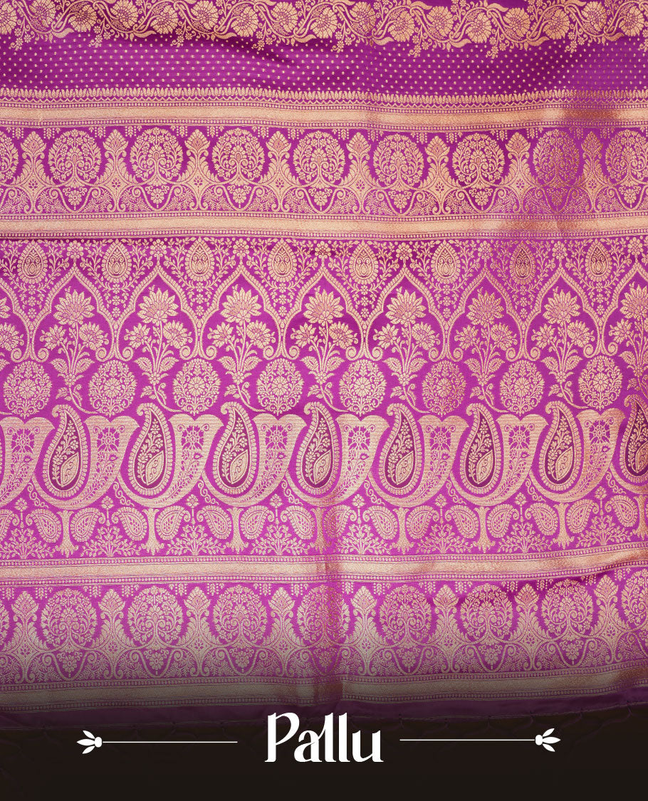 Grape purple colour Banaras Satin Crepe saree featuring gold zari floral motifs on the body, a richly woven traditional border with intricate gold zari detailing, and paired with a matching blouse. (Copy)