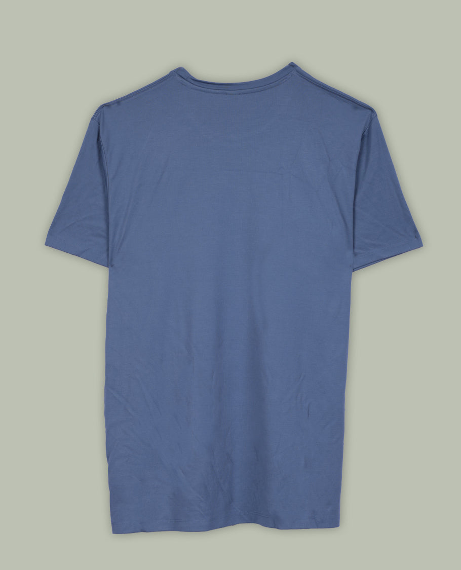 Greyish blue colour T shirt featuring a multicolour graphic print & designed with a classic round neck and short sleeves,made from soft breathable fabric for a comfortable and stylish everyday look.