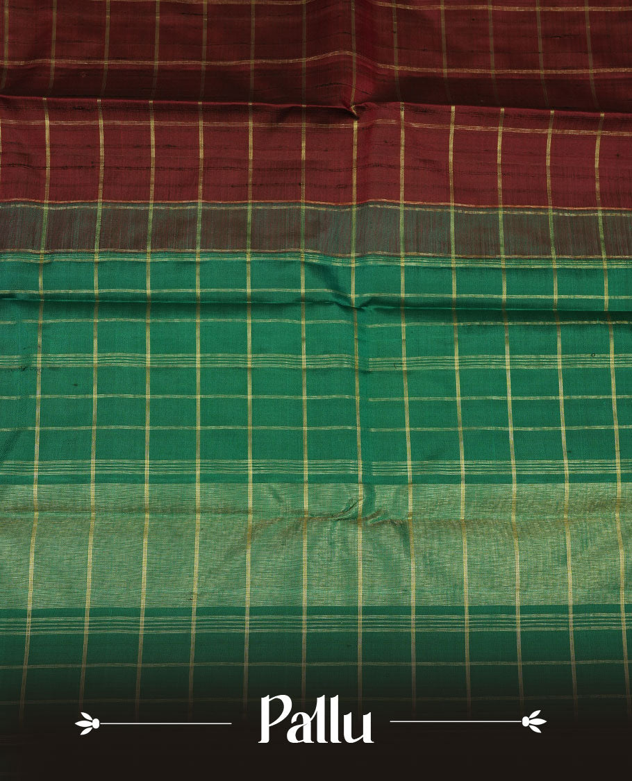 Maroon colour pure traditional Kancheepuram silk saree adorned with an elegant zari check pattern across the body, complemented by a contrast zari woven border, paired with a matching blouse piece.