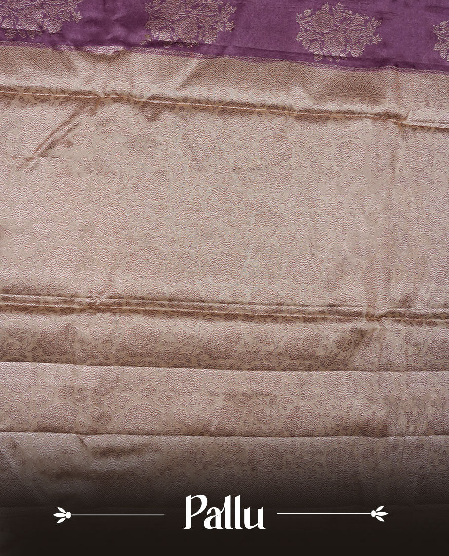 Purple colour pure banaras tusser silk saree highlighting antique zari pattern across body, with contrast cream colour with zari border and paired with matching blouse