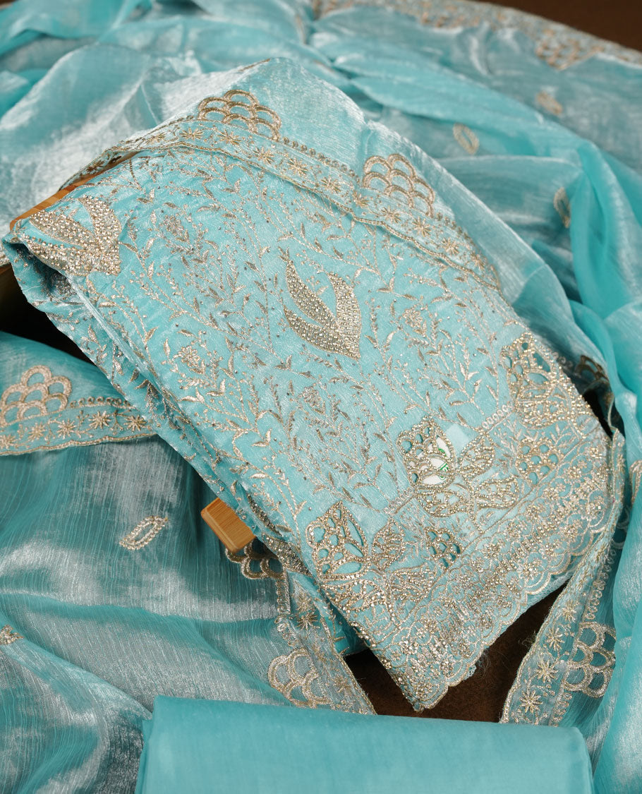 Sky blue colour churidar set with stone and thread embroidery and detailing, paired with matching pant and dupatta.