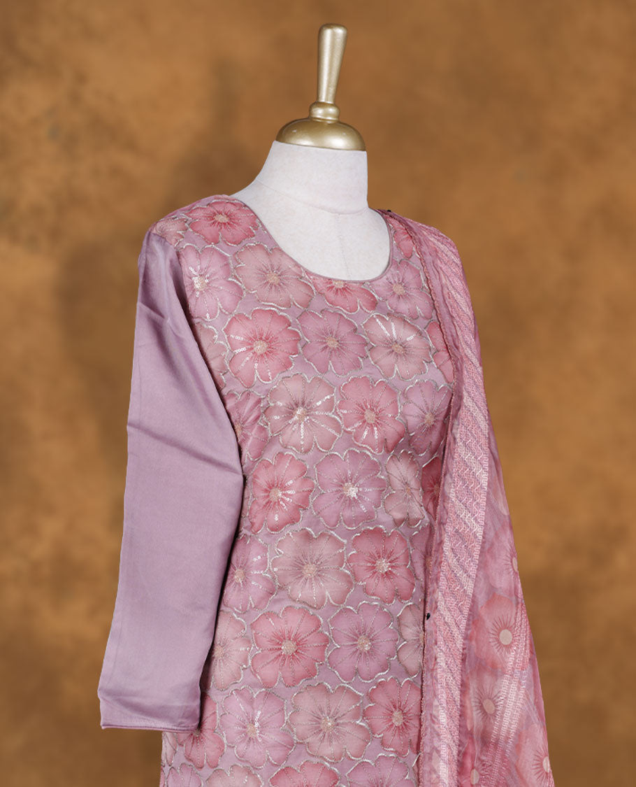Light lavender colour churidar set featuring U neckline, sleeves, and thread embroidery printed pattern on body , Paired with a matching dupatta