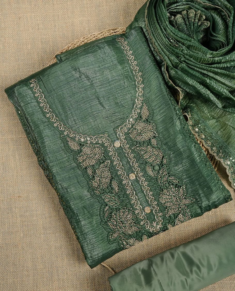 Deep green churidar suit material with delicate lace and sequin embroidery, paired with a textured matching dupatta and a plain coordinating bottom.