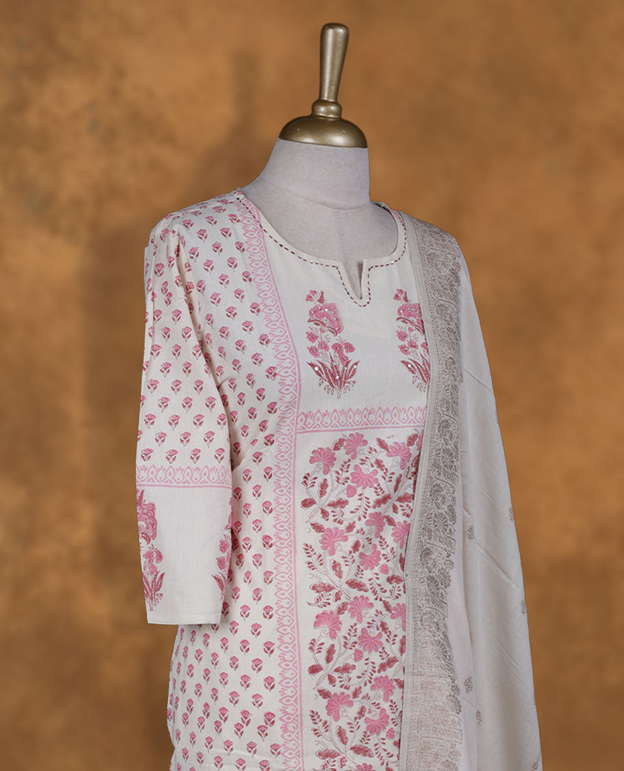 Cream colour churidar set featuring thread & cut beats embroidered on neckline, sleeves, and Pink colour floral print on body , Paired with a matching dupatta