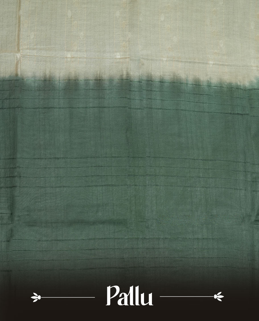 Cream & Green dye pattern colour semi jute saree highlighting white stripped body, without border and paired with matching blouse.