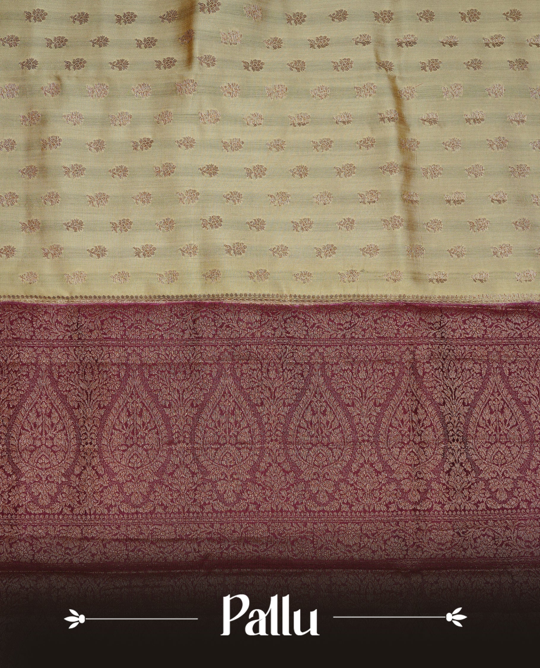 Cream colour pure tussar Banaras silk saree featuring intricate gold zari motifs across the body, enhanced with a contrast Maroon floral kodi zari border for a rich traditional look. Comes with a matching blouse piece.