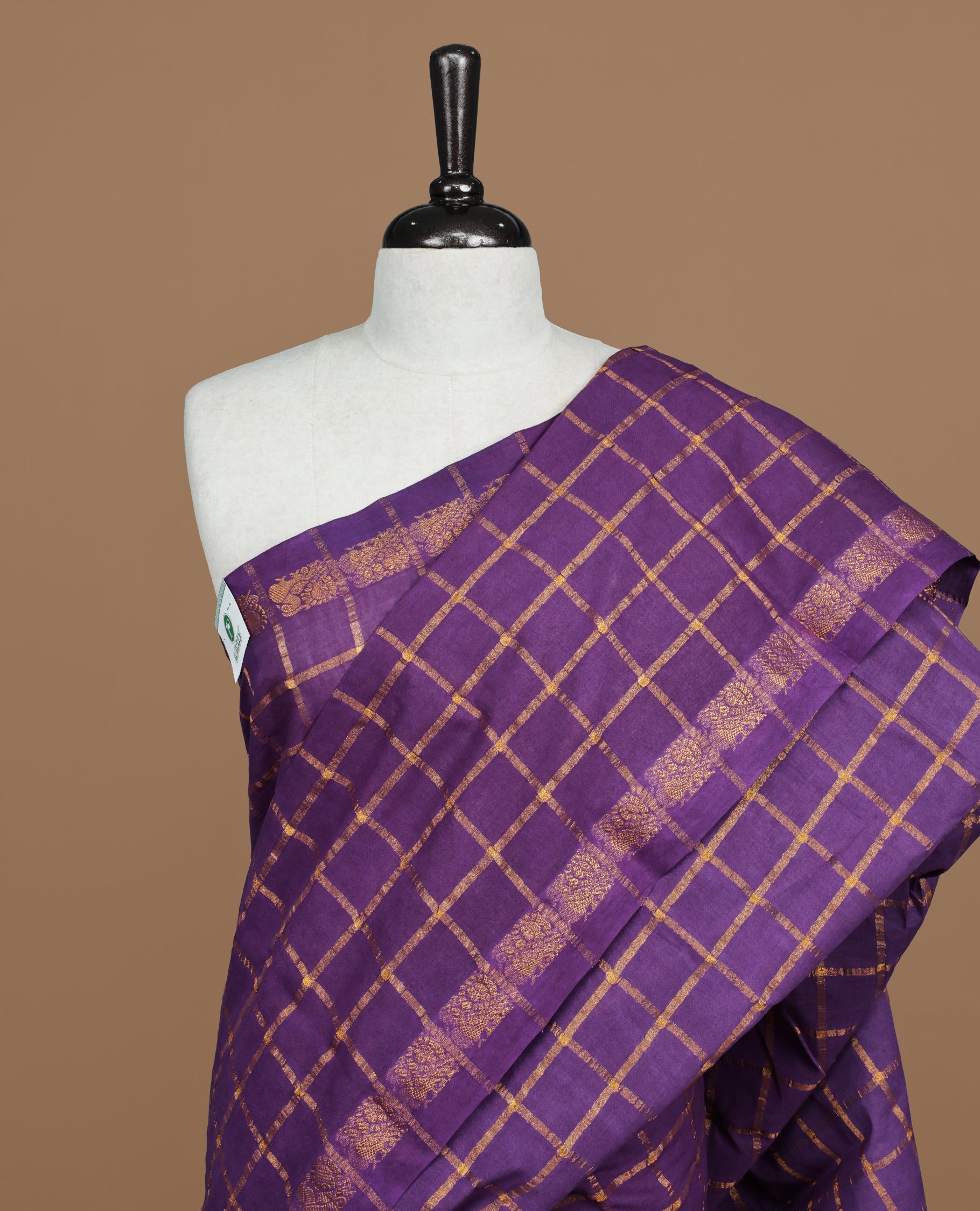 Violet colour Sungudi cotton saree featuring Gold zari Check pattern on body, Gold zari Peacock design on Self colour border, paired with matching blouse piece.