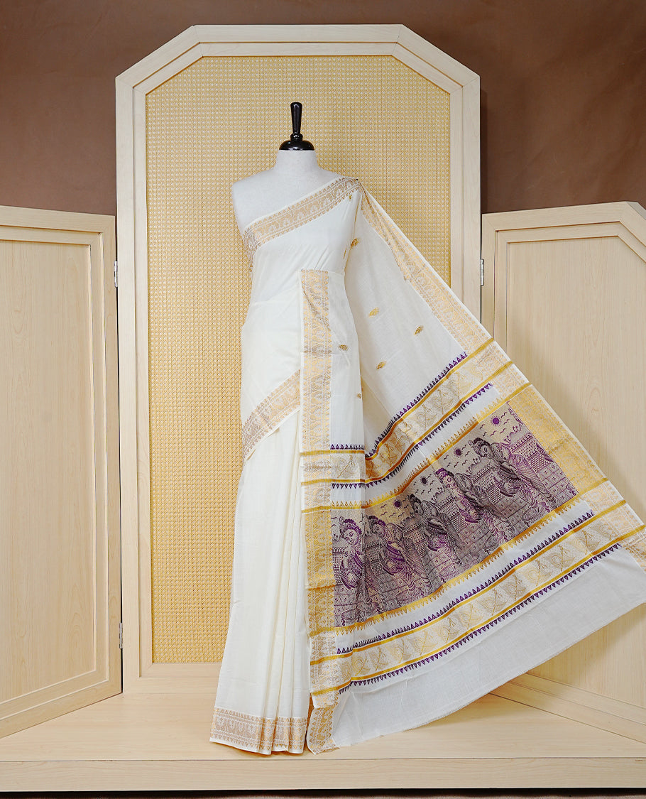 Cream Colour Cotton Kerala Saree Featuring Gold Buttas on the Body, a Classy Gold Zari Border, and a Traditional Violet Colour Lord Krishna Thread work and Gold Zari Pallu, Paired with a Matching Blouse Piece.