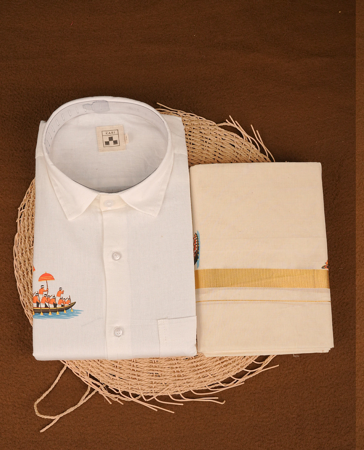 White colour shirt featuring Onam theme Pattern printed body, paired with cream colour double dhoti featuring gold zari with print border.