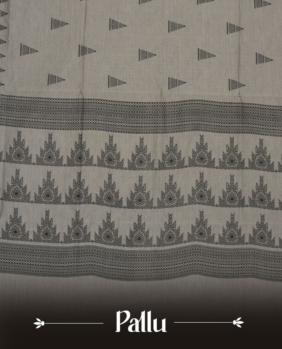 Gray colour poly cotton saree with black temple motifs on the body, paired with a matching with black woven traditional border, and a coordinated all‑over geometric printed blouse piece.