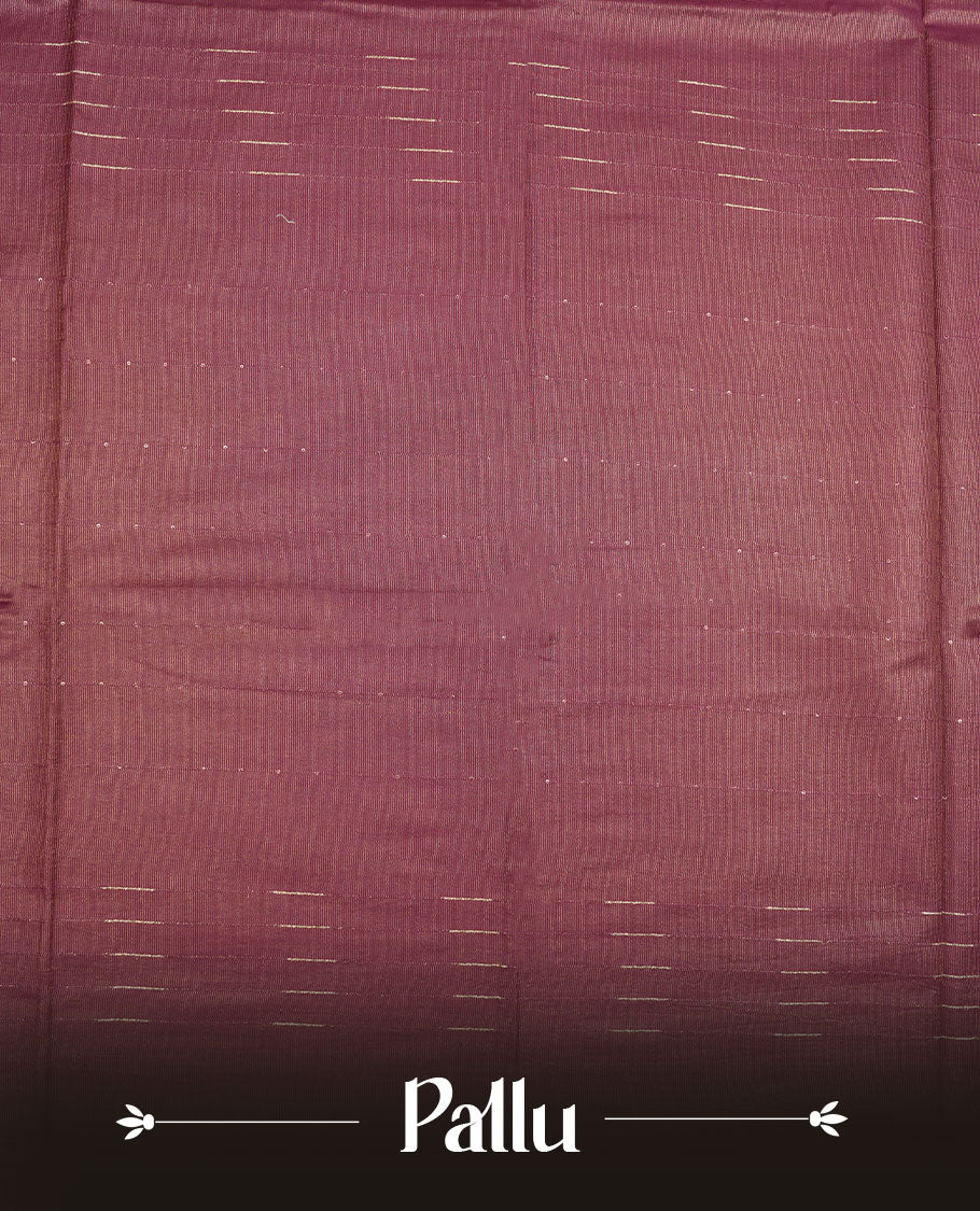 Burgundy colour semi jute saree highlighting gold zari stripped body with white motifs, without border and paired with matching blouse.