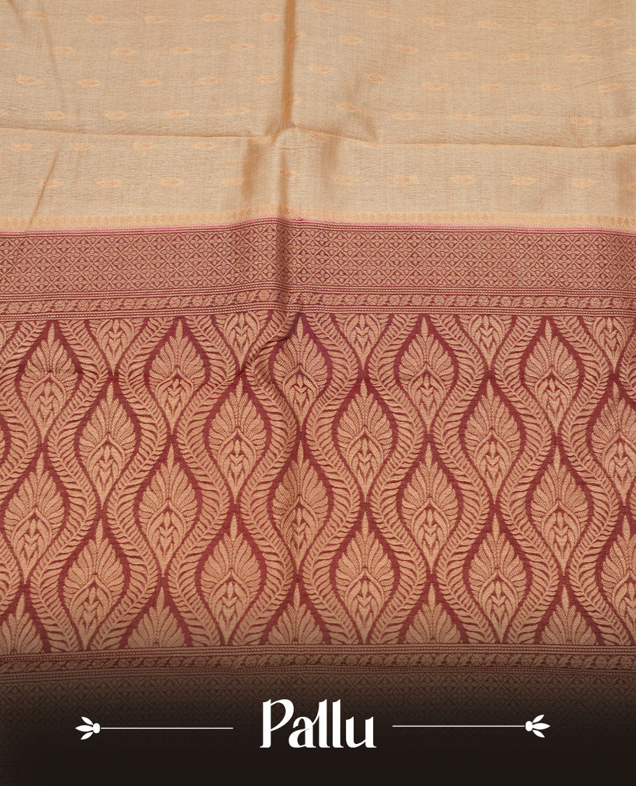 Light gold colour semi tussar saree featuring Gold zari buttas body, contrast chocolate brown colour gold zari border and comes with matching blouse piece.