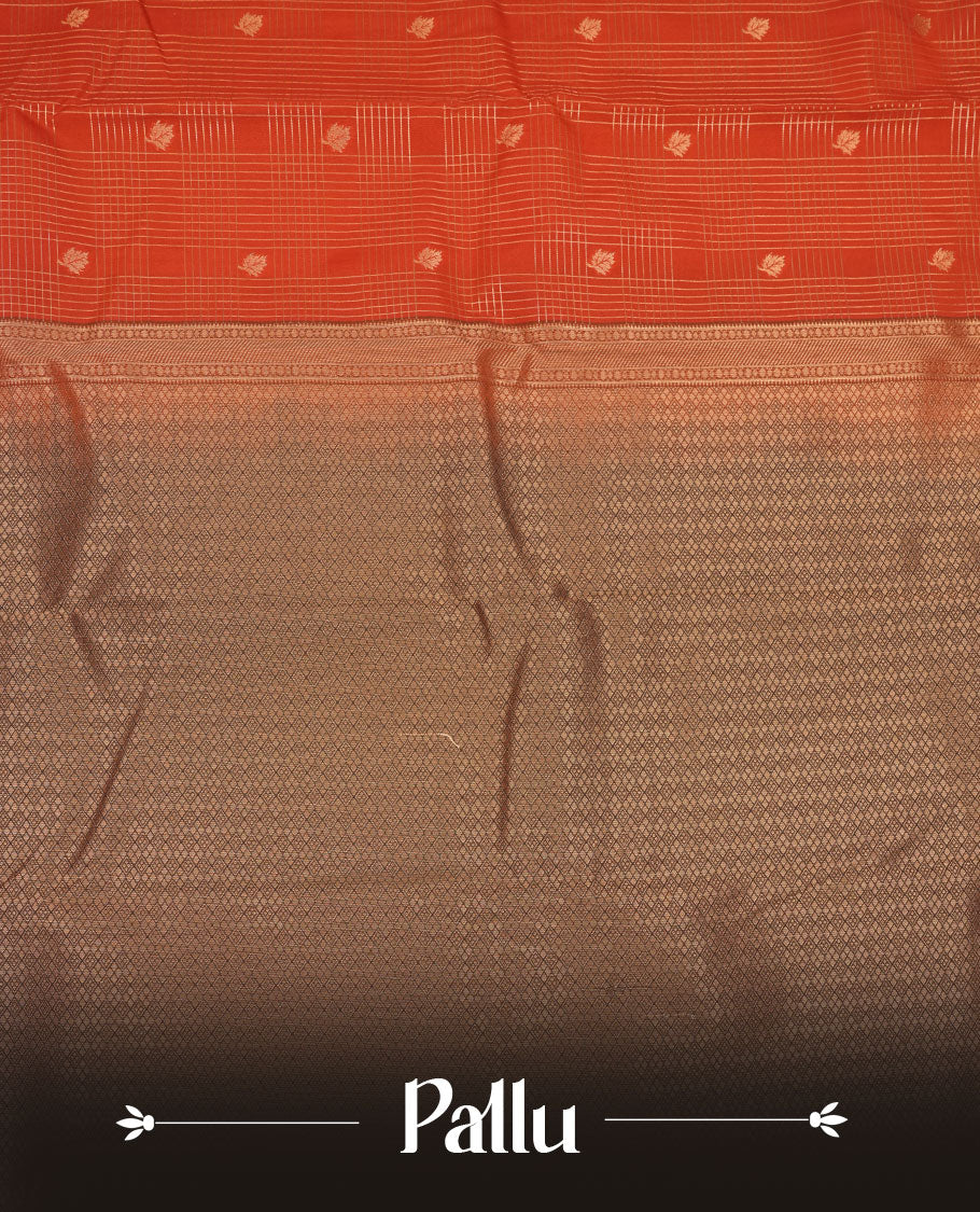 Dark Rust orange colour semi silk saree featuring gold zari checks and small motifs on body highlighting contrast dark chocolate border , paired with matching blouse