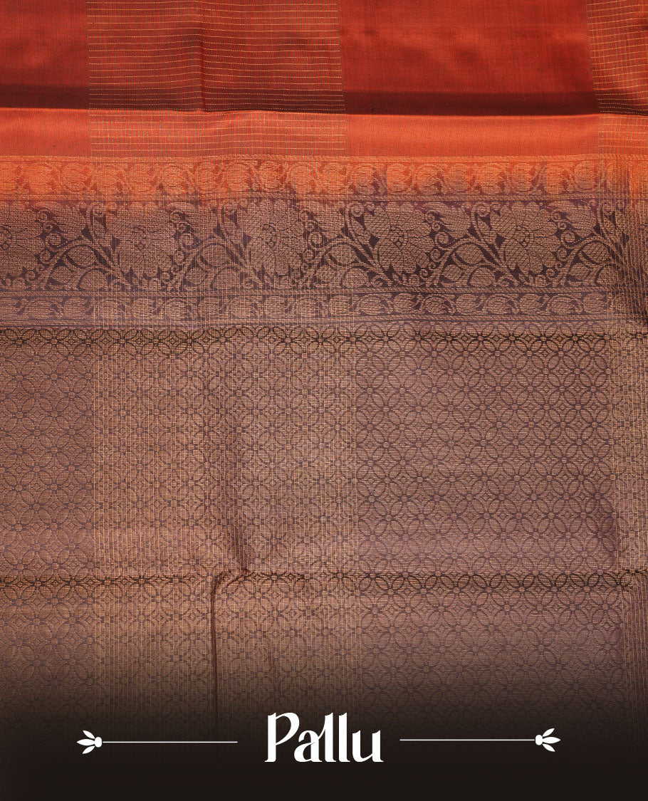 Brick red colour soft silk saree featuring zari check on body, complemented by contrast burgundy colour with peacock buttas border, paired with matching.