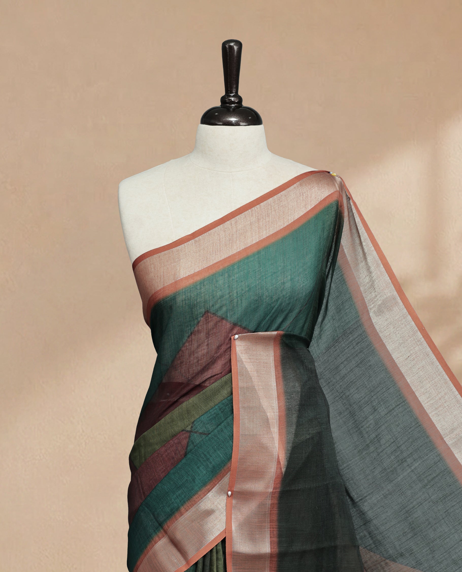 Olive Green Colour Semi Linen saree featuring digital printed body, Complemented by Borderless finish, comes with matching blouse piece.